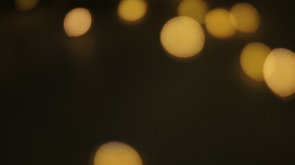 Natural Gold Color Bokeh Particles Effect Photo Overlays Background Glowing Abstract Lens Lights Defocused Circles and Blur Golden Glitter Beautiful Glamour Style. Use Screen Overlay Mode.