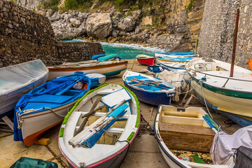 Fototapeta na wymiar Fishing boats litter the quayside at Praiano. Italy on the Amalfi coast