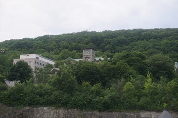 Montreal, QC/ Canada - 7/4/2020: A green mountain view. The middle is the historical building of the Allan Memorial Institute, Department of Psychology, Royal Victoria Hospital, McGill University.