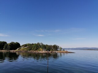 Island in the ocean on a beautiful summer day