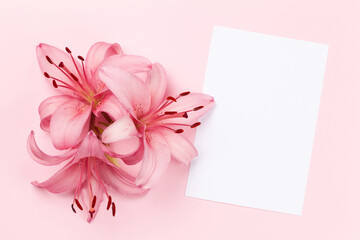 Obraz na płótnie Canvas Lily flowers and greeting card