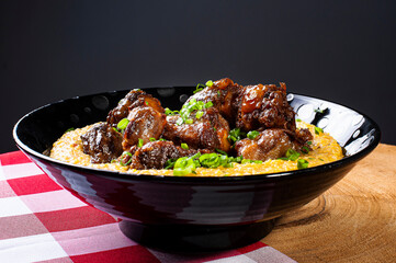 .Oxtail with hominy. Typical dish of Brazilian cuisine.