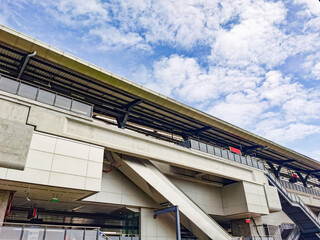 Architecture construction of elevator, escalator stairs and sky walk way, walk bridge between sky train station and department store mall