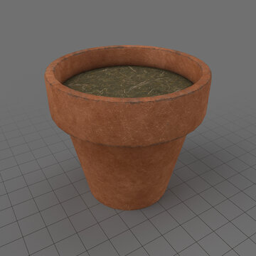 Terracotta pot filled with soil