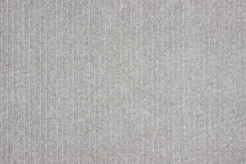 Fototapeta na wymiar Light gray stone background with light vertical stripes.
