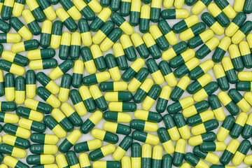 Colorful medical capsules closeup background