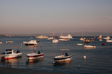 Fototapeta premium boats in the harbor at sunset in Turkey Tuzla
