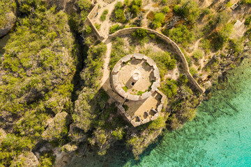 Aerial view of coast of Curaçao in the Caribbean Sea with turquoise water, cliff, beach, beautiful...