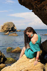 Woman portrait, smiling and beautiful, dreads hairstyle