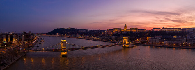 Panoramic aerial drone shot of Buda castle on Buda Hill during Budapest sunset
