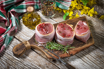 Beef tenderloin steaks wrapped in bacon.