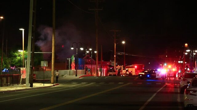 Police Lights And Smoke From Fire On City Street At Night Reno NV