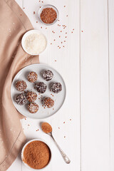 Energy balls on a plate with ingredients