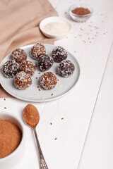 Energy balls on a plate with ingredients