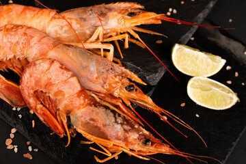 Raw shrimp langostino and lime