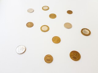 Belarusian coins on a white background of copper and alloys of metals. Folded with a stack. Saving. Stock for a rainy day.