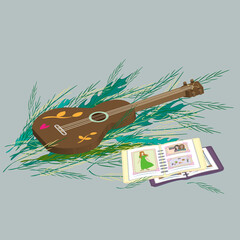 guitar is lying on the grass. romantic composition