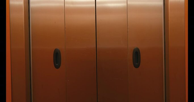 Automatic opening the doors of elevator on the nine floor.