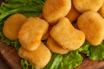 Tasty crispy fried chicken nuggets close-up. View from above.