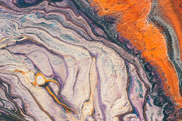 Fluid Art. Abstract colorful background, wallpaper. Mixing paints. Modern art. Marble texture