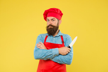 Seriously good food. time to eat. surprised bearded chef hold knife. brutal male cook in hat and apron. professional man cooking. restaurant cuisine and culinary. catering company ad. welcome to cafe