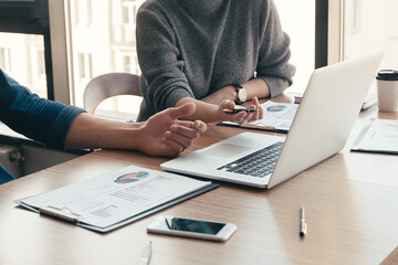 close up. group of employees discussing a financial chart.