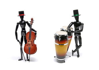 Two black wooden Artist's Figure as musicians isolated on white.Studio shot