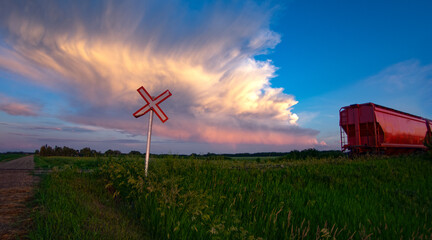  Railway Crossing on a Country Road at Sunset