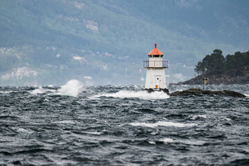 lighthouse in the stormy sea