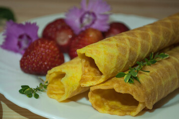 waffle rolls and strawberries for tea, breakfast