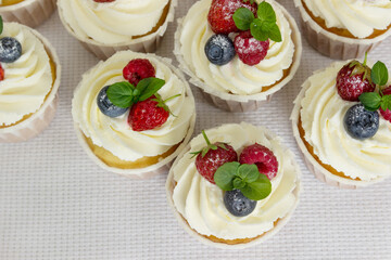 Vanillas Cupcakes  with Fresh Berries. Light dessert.