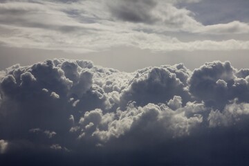 Fototapeta na wymiar Dramatic clouds in a dramatic blue sky.