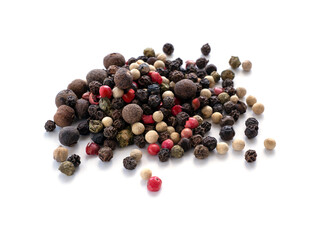 A mixture of peppers. Black, white, red polka dots. Isolated on a white background. Selected sharpness