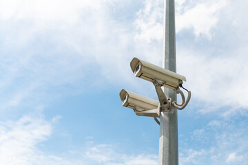 Security cameras on a concrete pole