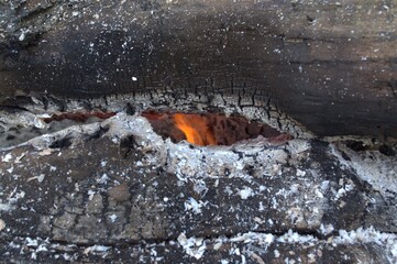 The flames between the logs. "Fiery eye".