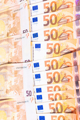stacked up 50 euros Bills