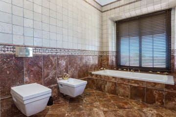 Naklejka na ściany i meble Modern stylish bathroom in the house, hotel, in beige and brown tones. Conceptual photo.