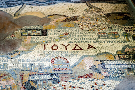 MADABA, JORDAN - APR 28, 2014:  Fragment of the oldest floor mosaic map of the Holy Land and Jerusalem in the Saint George's Church. It dates 6th century