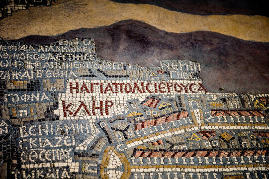 MADABA, JORDAN - APR 28, 2014:  Fragment of the oldest floor mosaic map of the Holy Land and Jerusalem in the Saint George's Church. It dates 6th century