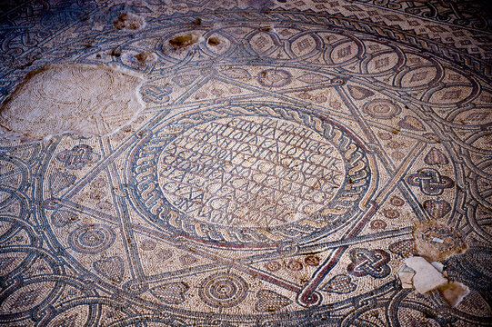 MADABA, JORDAN - APR 28, 2014: Huge mosaics in the Hippolytus Hall in the Archaeological Museum of Madaba. It's the place where some mosaics from the 5th to 7th are preserved