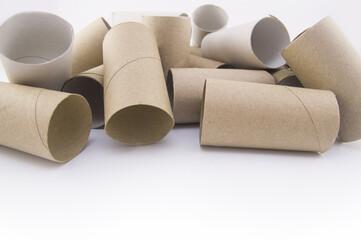 toilet paper bushings lie on a white background on isolate