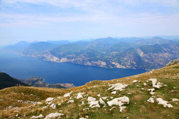 Fototapeta na wymiar Malcesine to Mount Baldo featuring beautiful views across the water and mountains