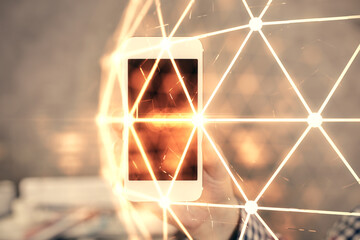 Double exposure of man's hands holding and using a phone and social network theme drawing.