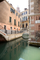 Beautiful peaceful scene of canal in Venice, Italy