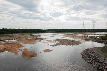landscape with a river on a cloudy day