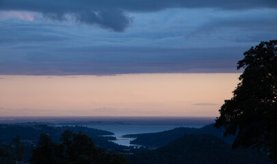 Panorama of Folsom Lake at Sunset with Dramatic Clouds Above from Foothills of Western Sierras