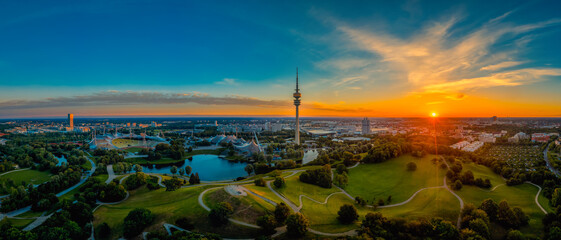Eyecatching sunrise view over Munich at a wonderful morning at a summer day as panorama.