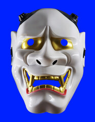 Japanese Hannya mask on a blue background