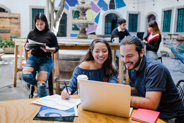 Successful hispanic teamwork or Group of latin young business people working together in creative...