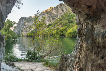 Fototapeta na wymiar Matka Canyon lake and river,rocky archway,near Skopje,Northern Macedonia.